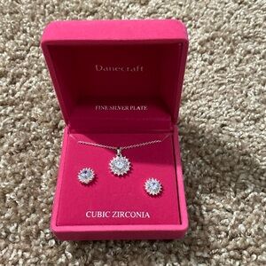 Necklace paired with matching earrings